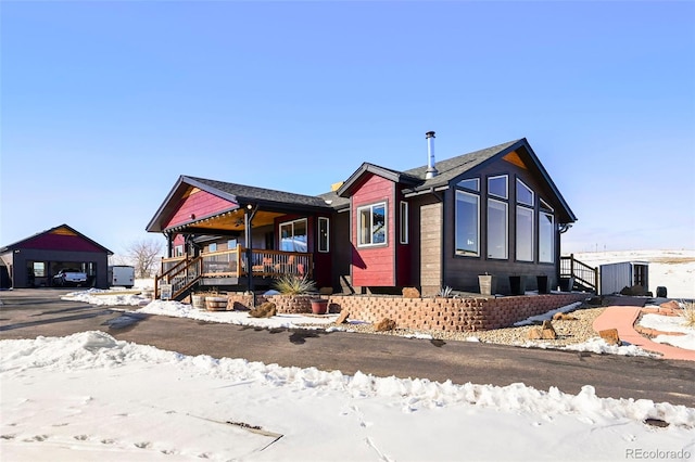 view of front of property featuring covered porch