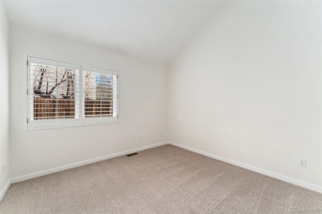 1904 S Union Pl, Lakewood, CO 80228 - spare room with carpet flooring, baseboards, and lofted ceiling
