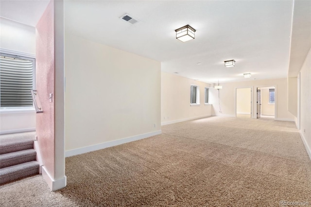1904 S Union Pl, Lakewood, CO 80228 - carpeted empty room with baseboards and stairway
