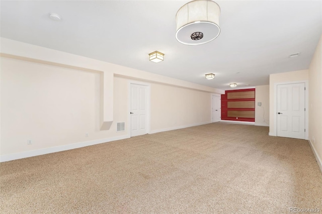 1904 S Union Pl, Lakewood, CO 80228 - empty room featuring light colored carpet, baseboards, and a smoke detector
