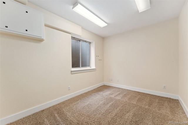 1904 S Union Pl, Lakewood, CO 80228 - unfurnished room featuring light colored carpet and baseboards