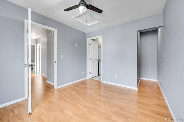 unfurnished bedroom with ceiling fan and light hardwood / wood-style floors