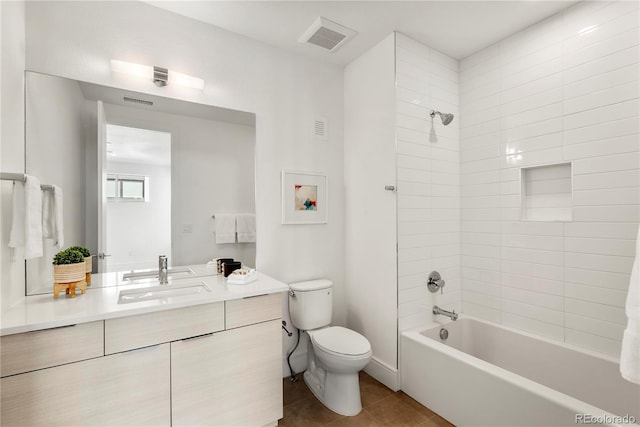 full bath with toilet, vanity, visible vents, shower / washtub combination, and tile patterned floors