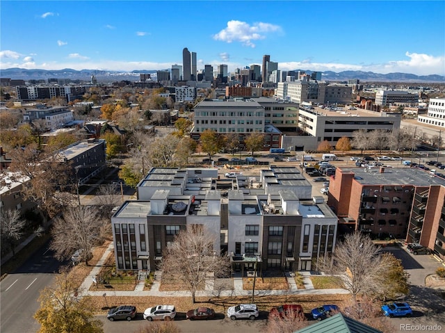 property's view of city featuring a mountain view