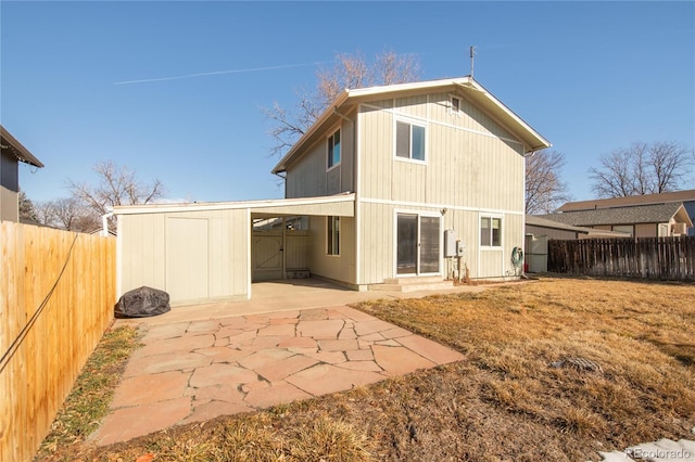 rear view of house with a patio area