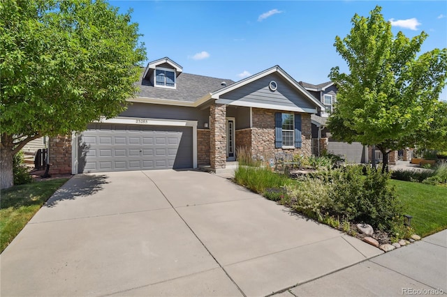 23285 Chapel Hill Ln, Parker, CO 80138 - view of front facade featuring stone siding, concrete driveway, and an attached garage