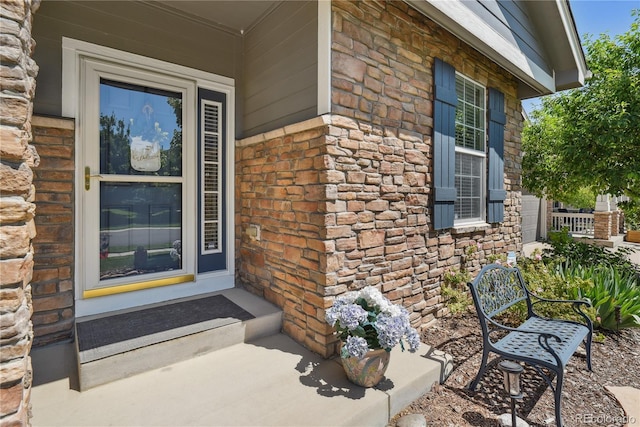 23285 Chapel Hill Ln, Parker, CO 80138 - entrance to property with stone siding and covered porch