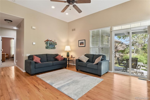 23285 Chapel Hill Ln, Parker, CO 80138 - living room with a ceiling fan, light wood-type flooring, recessed lighting, and a towering ceiling