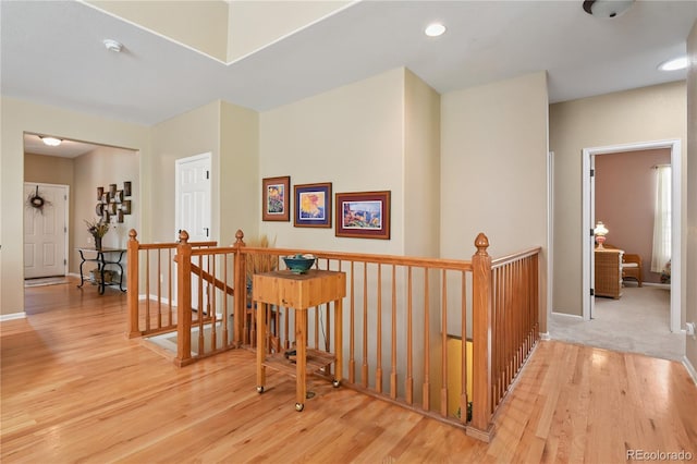 23285 Chapel Hill Ln, Parker, CO 80138 - hallway with an upstairs landing, wood finished floors, and recessed lighting