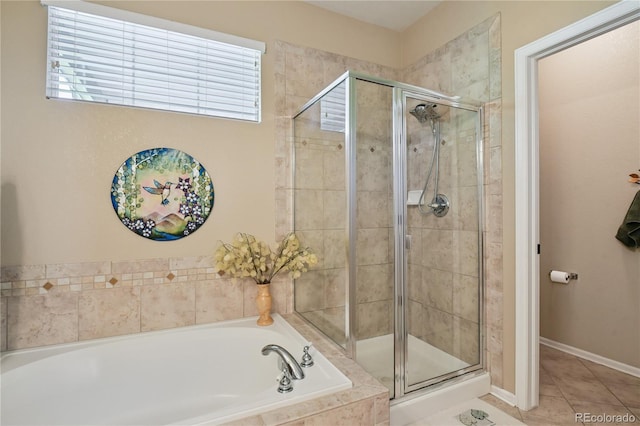 23285 Chapel Hill Ln, Parker, CO 80138 - full bath featuring a bath, a stall shower, and tile patterned flooring