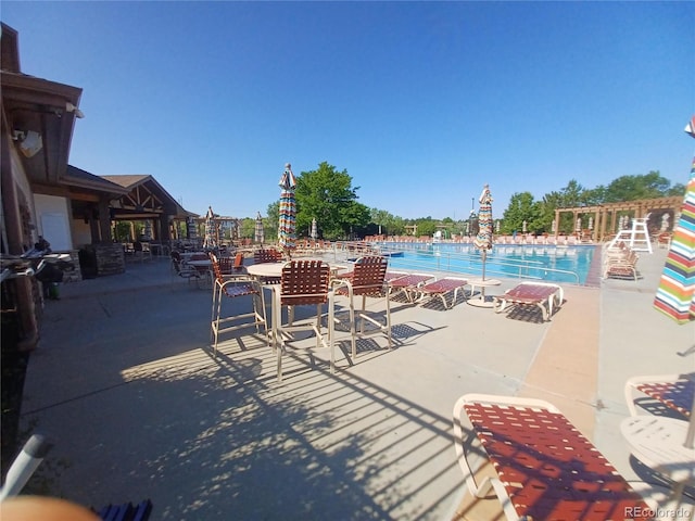 23285 Chapel Hill Ln, Parker, CO 80138 - community pool featuring a patio area