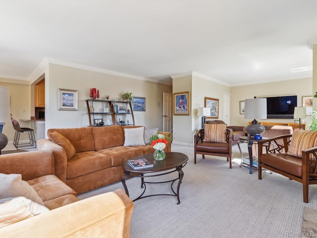 living area with light colored carpet and crown molding