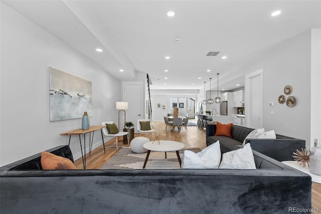 living room featuring light wood-type flooring