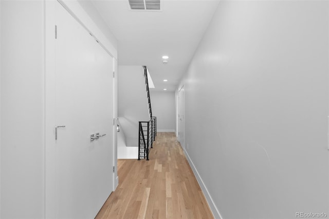 hallway featuring light wood-type flooring