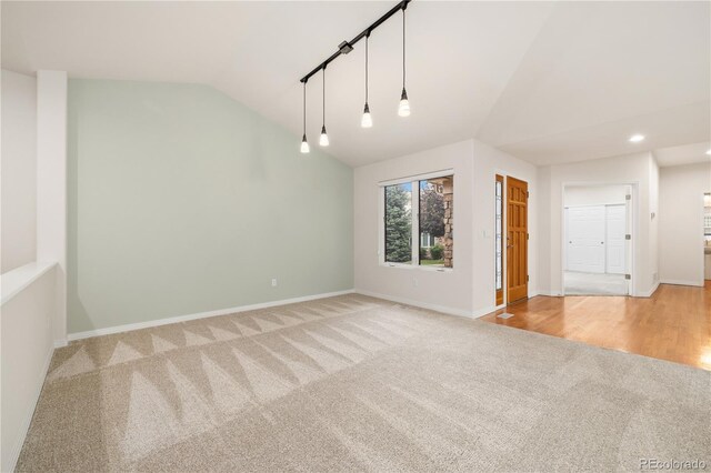 14032 E Chenango Dr, Aurora, CO 80015 - carpeted spare room featuring lofted ceiling, baseboards, and recessed lighting