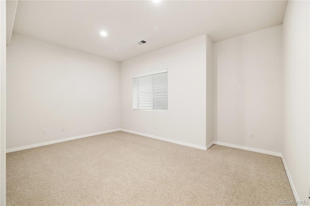 14032 E Chenango Dr, Aurora, CO 80015 - unfurnished room featuring light colored carpet, recessed lighting, and baseboards
