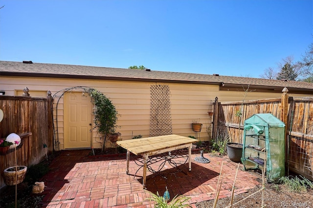 view of patio with fence