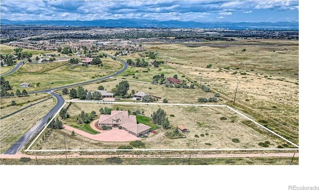 bird's eye view with a mountain view and a rural view