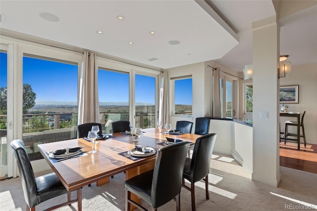 view of carpeted dining space