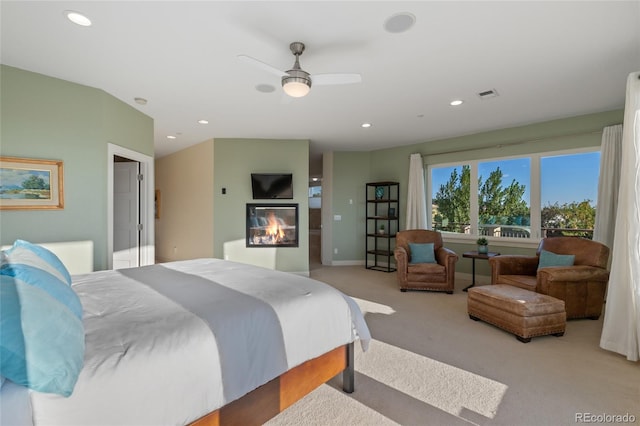 carpeted bedroom with ceiling fan