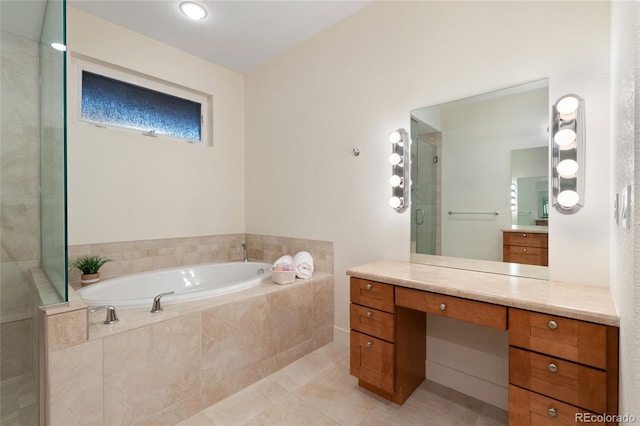 bathroom featuring separate shower and tub, tile patterned floors, and vanity