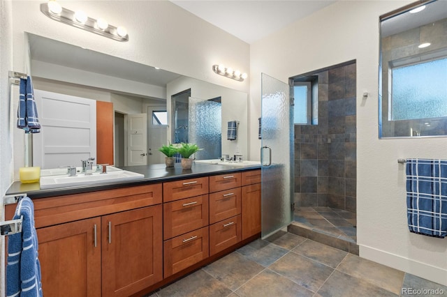 bathroom featuring vanity and walk in shower