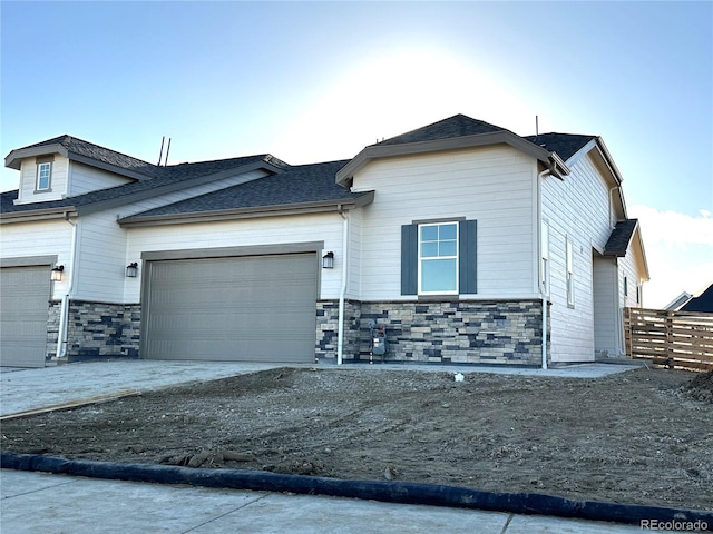 view of front of property with a garage