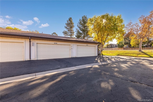 garage with a lawn