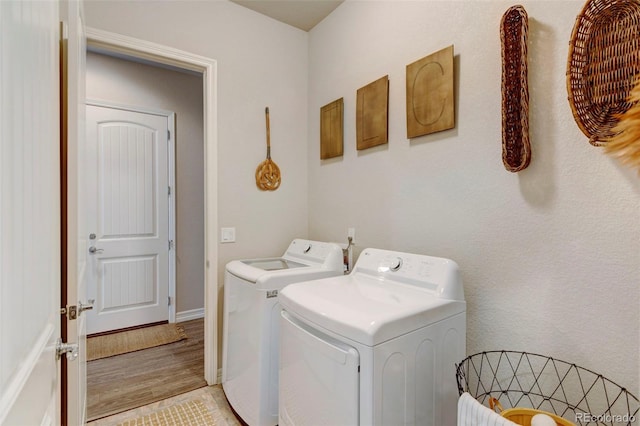 washroom with washer and clothes dryer