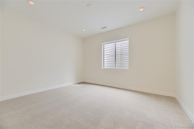 unfurnished room with carpet