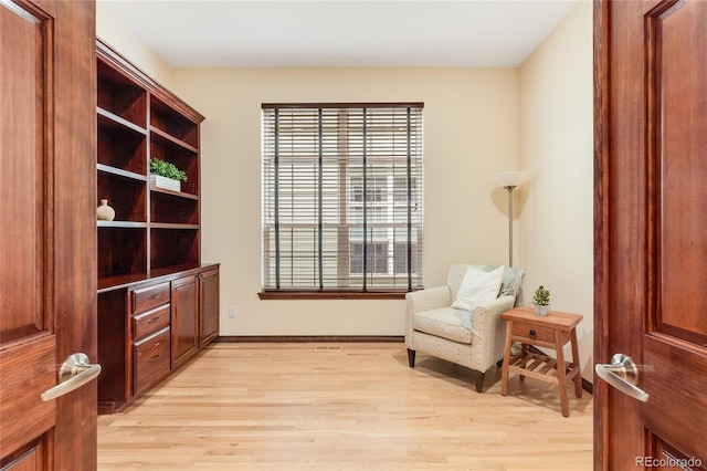5723 S Union Ct, Littleton, CO 80127 - living area featuring light wood finished floors and baseboards