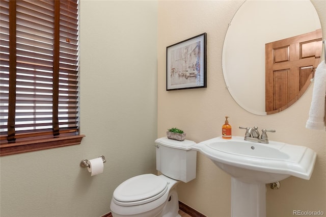 5723 S Union Ct, Littleton, CO 80127 - bathroom featuring toilet and baseboards