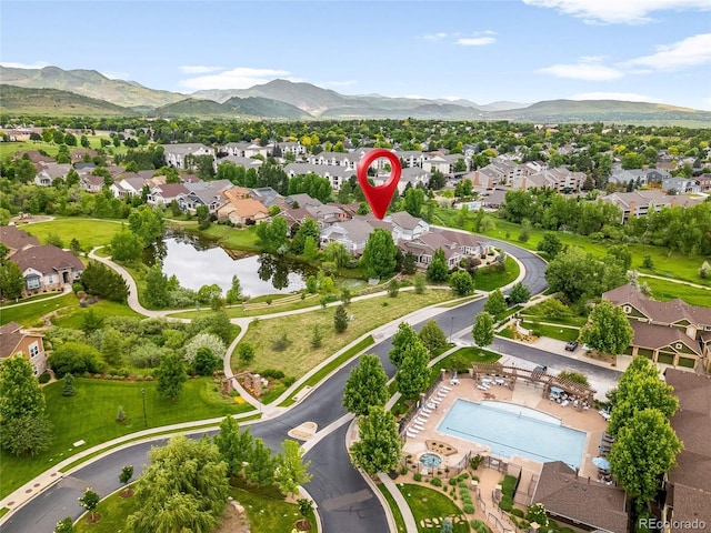 5723 S Union Ct, Littleton, CO 80127 - aerial perspective of suburban area featuring a pool and a water and mountain view