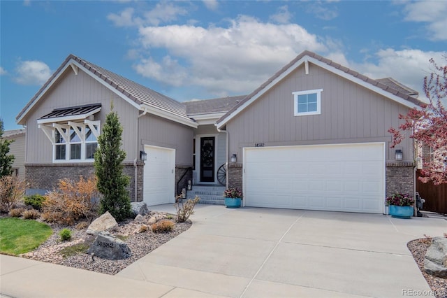 single story home with brick siding, driveway, a tile roof, and a garage