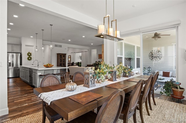 dining room with recessed lighting, a ceiling fan, visible vents, and dark wood-type flooring
