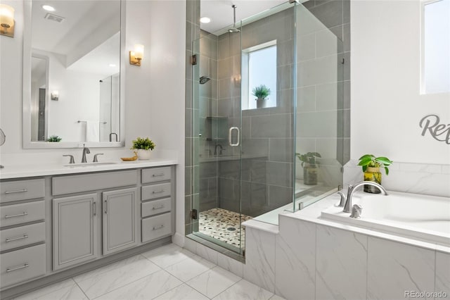 full bath with visible vents, vanity, marble finish floor, a bath, and a stall shower