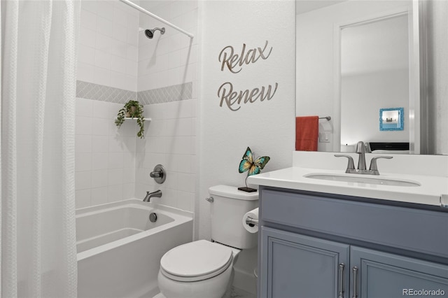 bathroom featuring vanity, toilet, and shower / tub combo