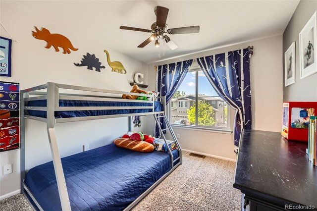 10694 Cedarcrest Cir, Highlands Ranch, CO 80130 - bedroom featuring baseboards, carpet floors, and ceiling fan