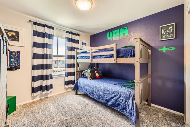 10694 Cedarcrest Cir, Highlands Ranch, CO 80130 - carpeted bedroom featuring baseboards