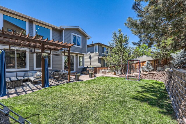 10694 Cedarcrest Cir, Highlands Ranch, CO 80130 - rear view of house with an outdoor living space, a pergola, and a patio