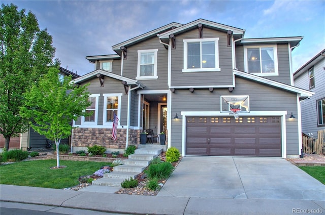 10694 Cedarcrest Cir, Highlands Ranch, CO 80130 - view of front of house with a garage, driveway, and stone siding