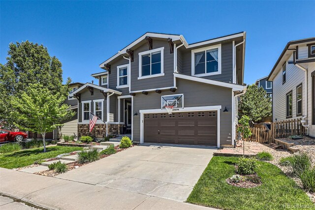 10694 Cedarcrest Cir, Highlands Ranch, CO 80130 - view of front of home featuring concrete driveway and an attached garage