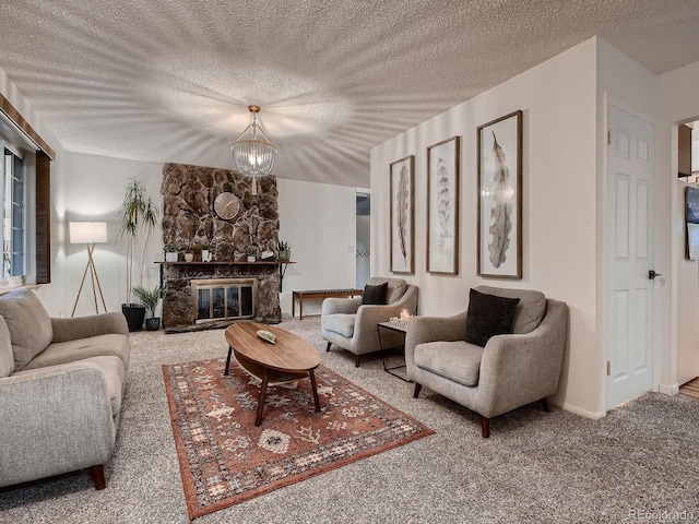 7112 S Platte Canyon Dr, Littleton, CO 80128 - carpeted living area featuring a textured ceiling and a stone fireplace