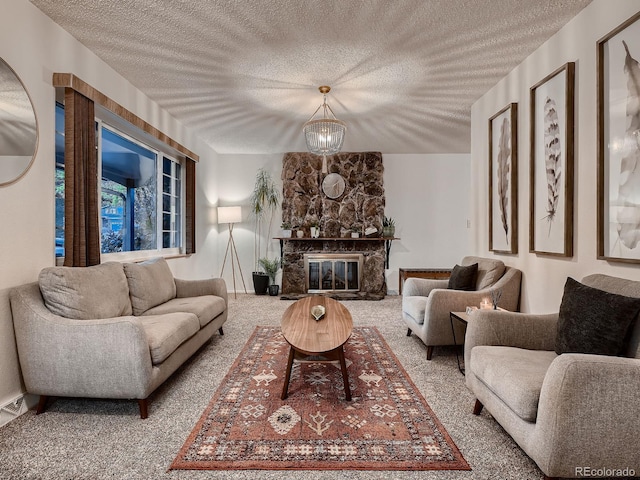 7112 S Platte Canyon Dr, Littleton, CO 80128 - living area featuring carpet, a textured ceiling, and a stone fireplace