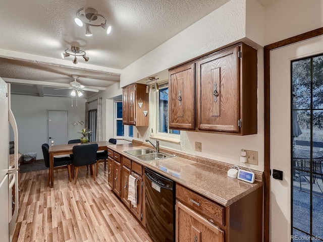 7112 S Platte Canyon Dr, Littleton, CO 80128 - kitchen featuring a sink, black dishwasher, a textured ceiling, light wood-style floors, and a ceiling fan