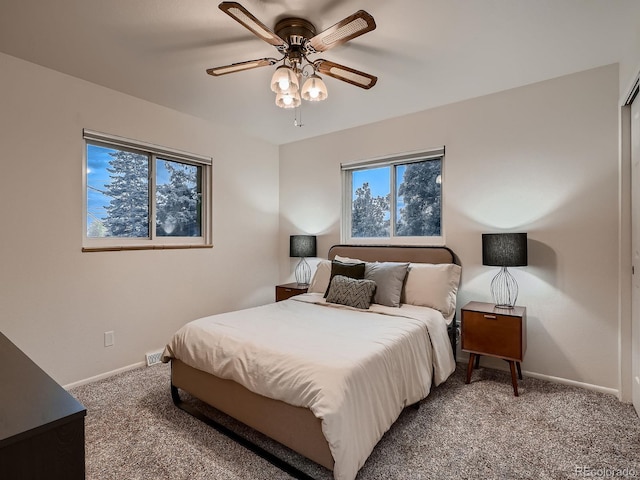 7112 S Platte Canyon Dr, Littleton, CO 80128 - carpeted bedroom featuring baseboards and ceiling fan