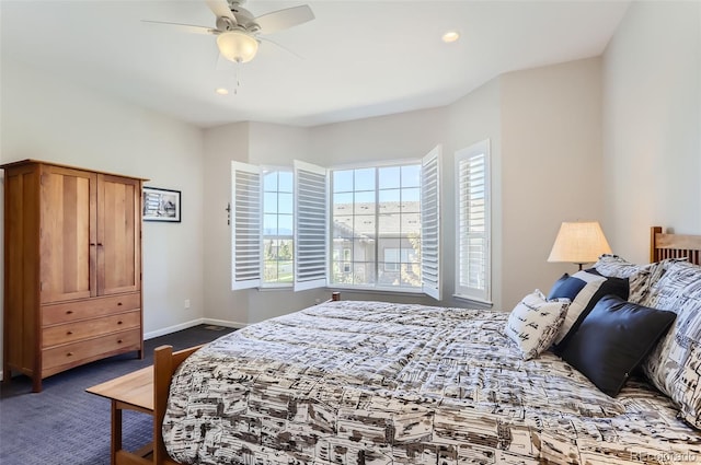 carpeted bedroom with ceiling fan