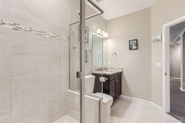 bathroom with vanity and an enclosed shower