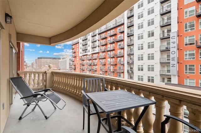 balcony featuring a city view