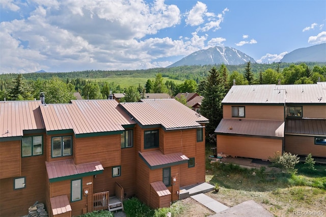 329 N Chipmunk Cir, Silverthorne, CO 80498 - view of front of home with a mountain view and a metal roof